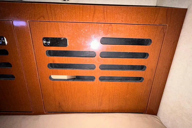 Slide: The Image of Interior wooden cabinet of 2012 Sea Ray Sundancer 310 boat. - 152