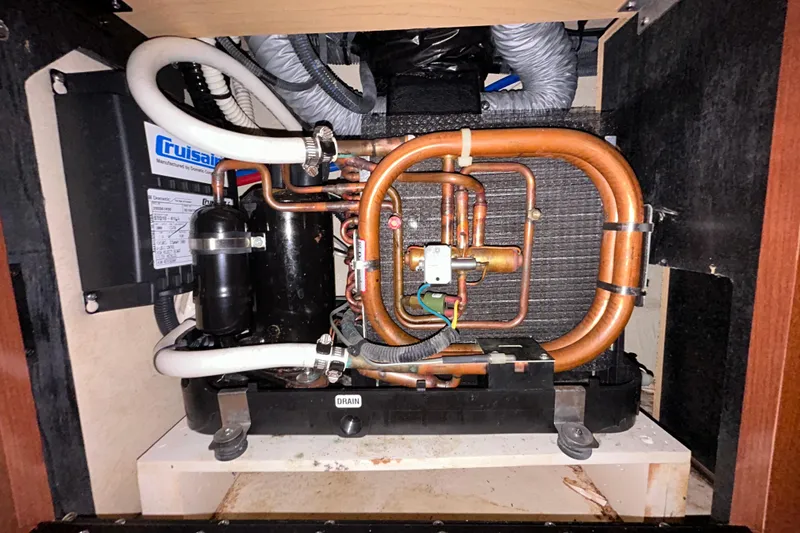 Slide: The Image of 2012 Sea Ray Sundancer 310 interior with Max Power thruster installation. - 157