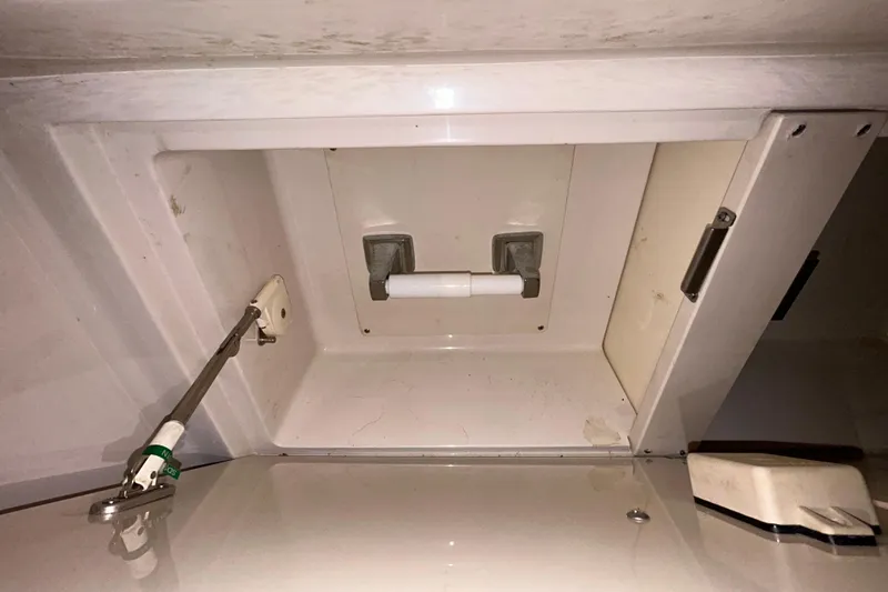 Slide: The Image of Wooden cabinet interior of 2012 Sea Ray Sundancer 310 yacht. - 163