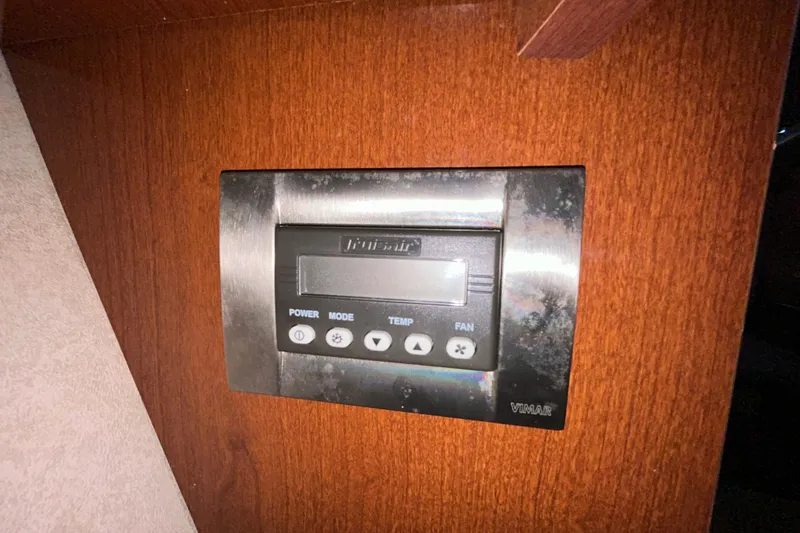 Slide: The Image of Bathroom interior of 2012 Sea Ray Sundancer 310 yacht with sink and porthole. - 177