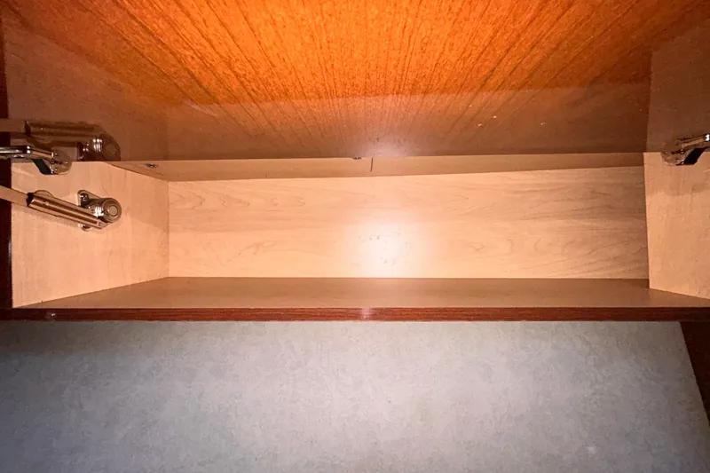 Slide: The Image of Interior storage compartment of a 2012 Sea Ray Sundancer 310 boat. - 179