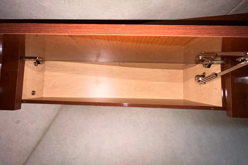 Slide: The Image of Storage compartment inside a 2012 Sea Ray Sundancer 310 boat. - 181