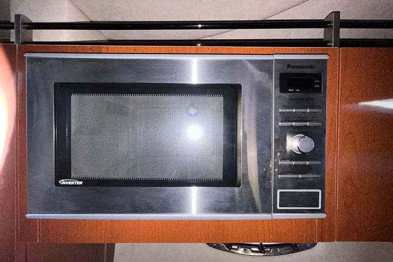 Slide: The Image of Wooden vent panel on 2012 Sea Ray Sundancer 310 boat interior. - 191