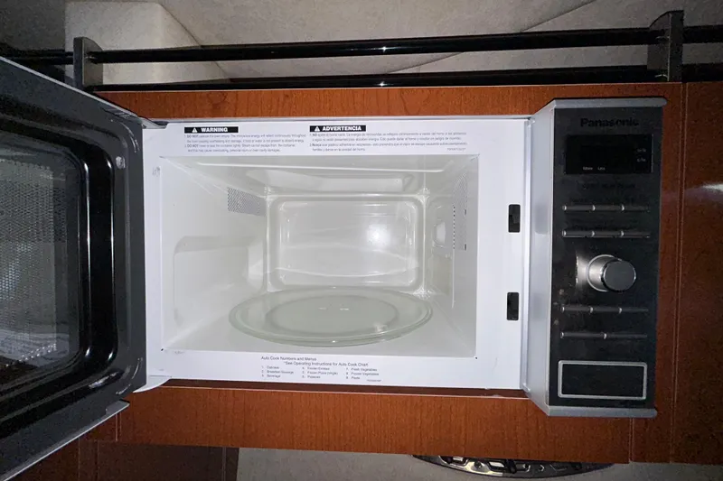 Slide: The Image of 2012 Sea Ray Sundancer 310 interior showing exposed mechanical components. - 192