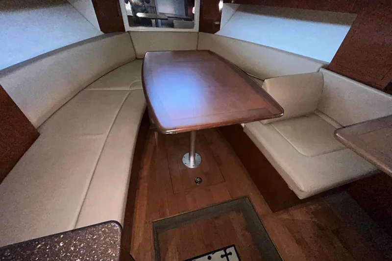 Slide: The Image of Engine compartment of a 2012 Sea Ray Sundancer 310 with Mercury MerCruiser details. - 204