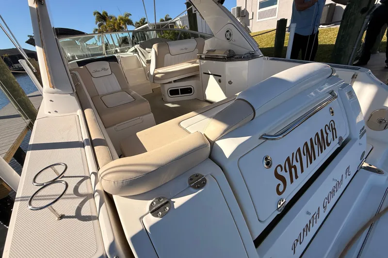 Slide: The Image of 2012 Sea Ray 310 Sundancer boat interior with seating, docked in Punta Gorda, FL. - 27