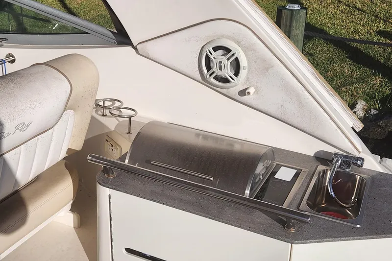 Slide: The Image of Close-up of 2012 Sea Ray 310 Sundancer boat propellers above water. - 5