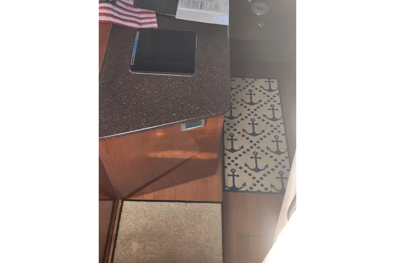 Slide: The Image of Close-up of a 2012 Sea Ray 310 Sundancer boat propeller in water. - 7