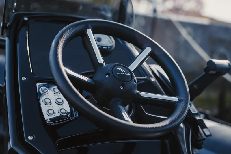 Slide: The Image of Steering wheel of Highfield Patrol 460 boat, year 2026. - 2
