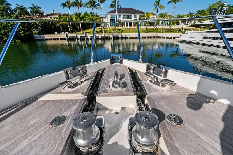 Slide: The Image of Bow view of 2019 Ferretti Yachts 780, docked near luxury waterfront property. - 14
