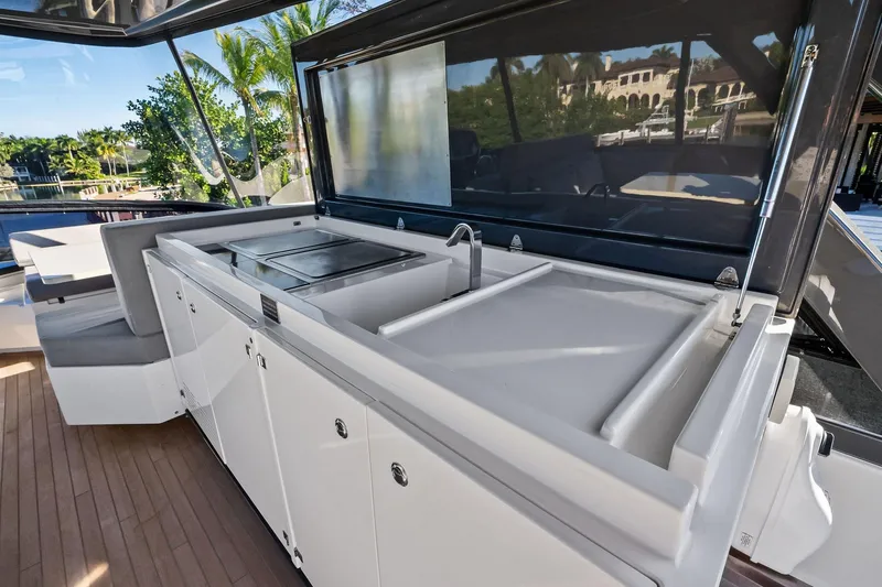 Slide: The Image of Luxurious outdoor kitchen on 2019 Ferretti Yachts 780, featuring sleek countertops and modern amenities. - 16