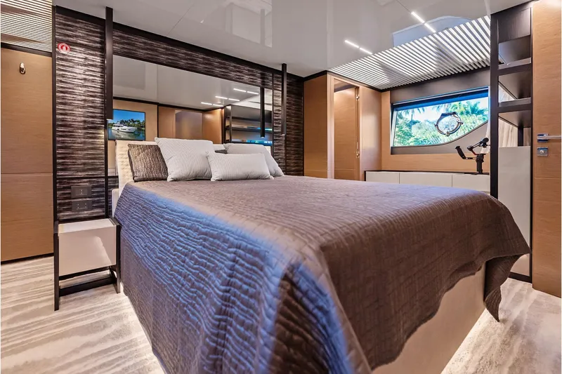 Slide: The Image of Luxurious bedroom interior of 2019 Ferretti Yachts 780 with modern design and large window. - 34