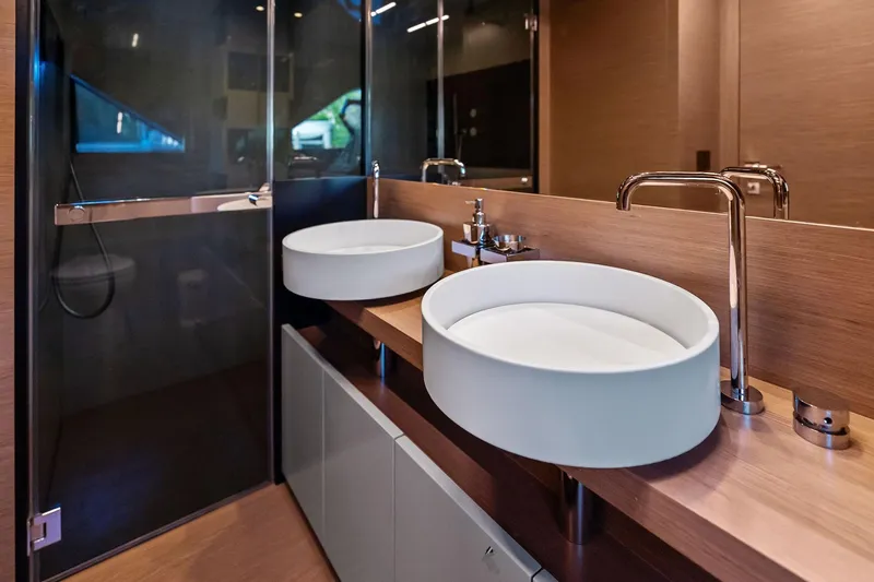 Slide: The Image of Luxurious bathroom in 2019 Ferretti Yachts 780, featuring modern dual sinks and elegant fixtures. - 39