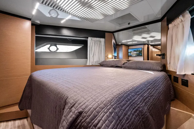 Slide: The Image of Luxurious bedroom interior of 2019 Ferretti Yachts 780 with modern design and elegant bedding. - 54