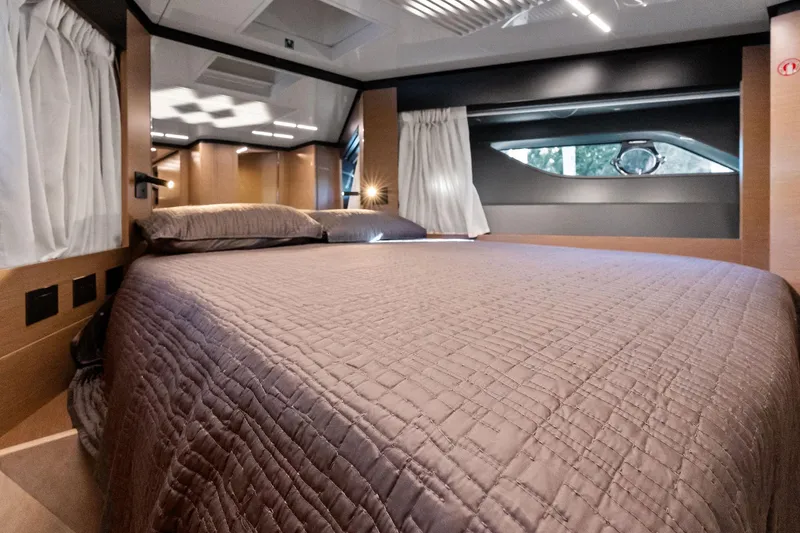 Slide: The Image of Luxurious bedroom interior of 2019 Ferretti Yachts 780 with elegant bedding and modern design. - 55
