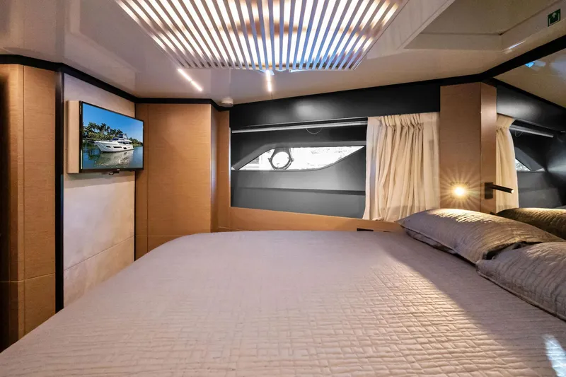 Slide: The Image of Luxurious bedroom interior of 2019 Ferretti Yachts 780 with modern design and elegant lighting. - 56