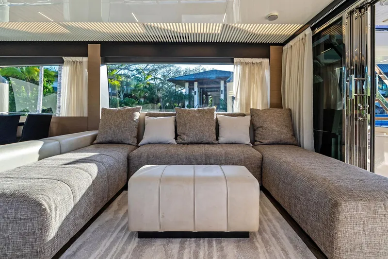 Slide: The Image of Luxurious interior of 2019 Ferretti Yachts 780 with plush seating and modern decor. - 25