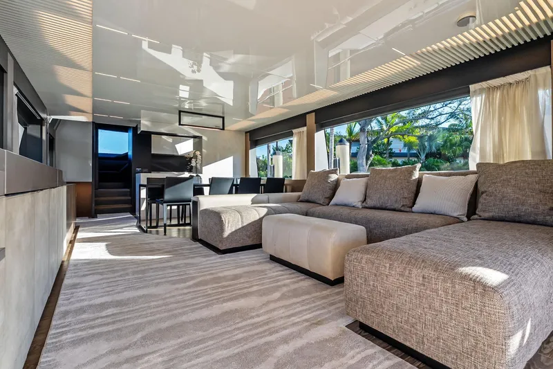 Slide: The Image of Luxurious interior of 2019 Ferretti Yachts 780 with modern furnishings and large windows. - 27