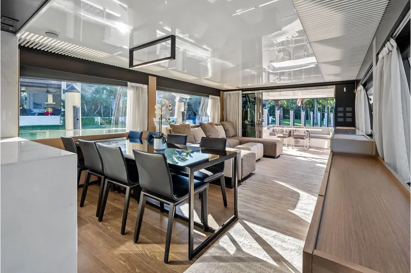 Slide: The Image of Luxurious interior of 2019 Ferretti Yachts 780 with modern dining and seating area. - 29