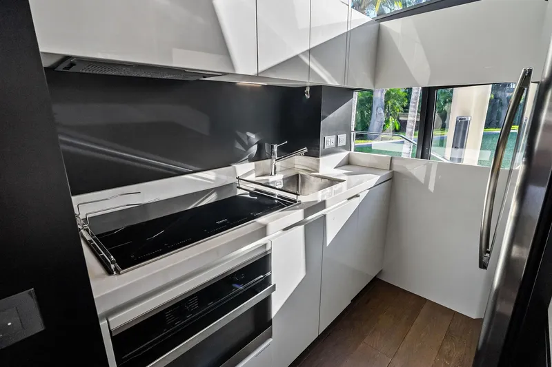 Slide: The Image of Modern kitchen interior on 2019 Ferretti Yachts 780, featuring sleek design and stainless steel appliances. - 31