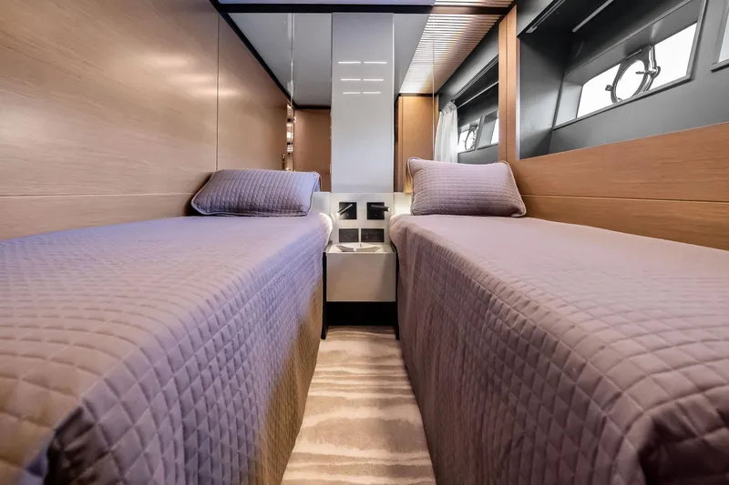 Slide: The Image of Luxurious twin cabin interior of 2019 Ferretti Yachts 780, featuring modern design and comfort. - 49