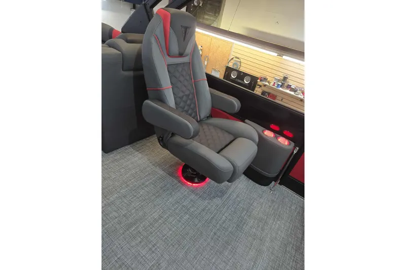 Slide: The Image of Luxurious Trifecta SS 25RF 2026 boat seat with red accents and ambient lighting. - 19
