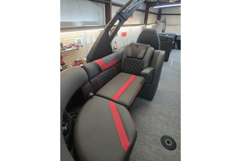 Slide: The Image of Luxurious seating in 2026 Trifecta SS 25RF boat with modern design and red accents. - 20