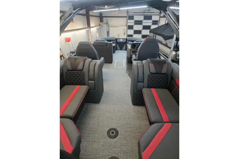 Slide: The Image of Luxurious interior of 2026 Trifecta SS 25RF pontoon boat with modern seating design. - 21