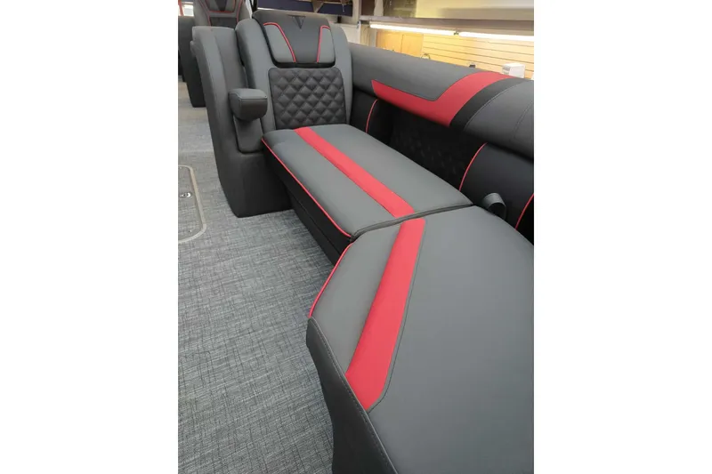 Slide: The Image of Luxurious seating in 2026 Trifecta SS 25RF with red accents and quilted design. - 24