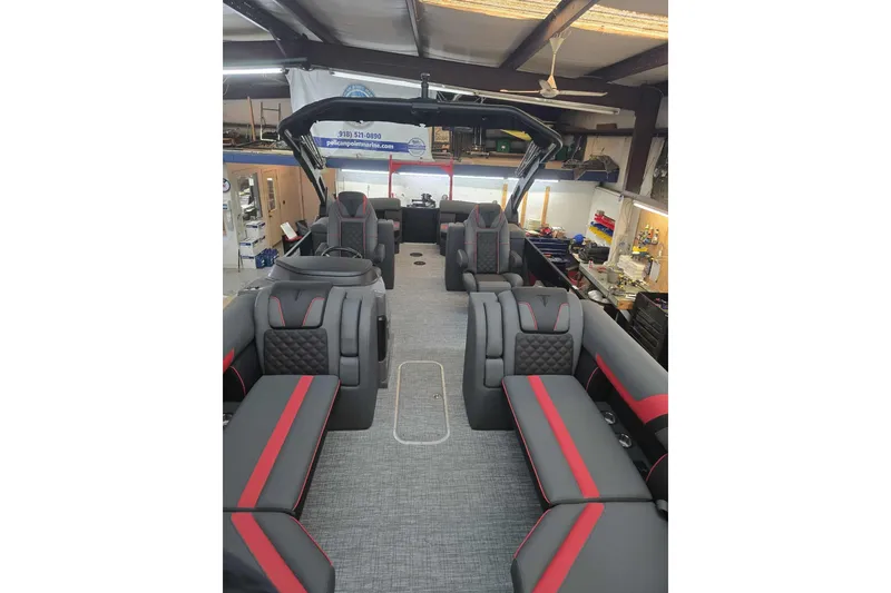 Slide: The Image of 2026 Trifecta SS 25RF pontoon boat interior with modern seating and sleek design. - 25