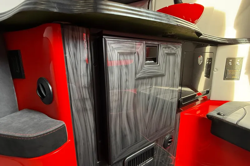 Slide: The Image of Interior of a 2020 MTI 42V boat featuring sleek cabinetry and modern design elements. - 14