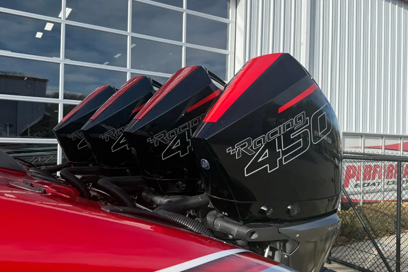 Slide: The Image of Four MTI 42V Racing 450 outboard motors on a red boat, 2020 model. - 24