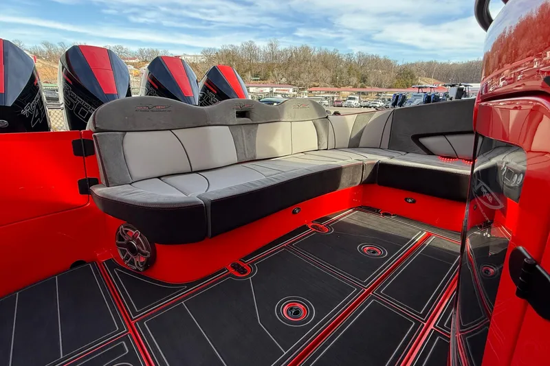 Slide: The Image of Luxurious MTI 42V 2020 boat interior with red and gray seating and powerful engines. - 31