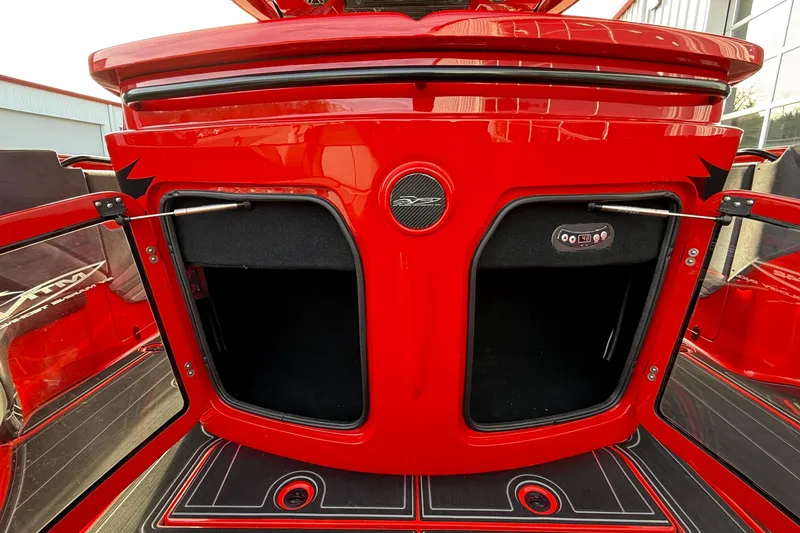 Slide: The Image of Red MTI 42V boat interior, open storage compartments, sleek design, 2020 model. - 32