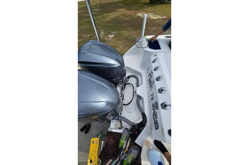 Slide: The Image of 2014 Everglades 295 Pilot boat with dual outboard motors, viewed from above. - 10