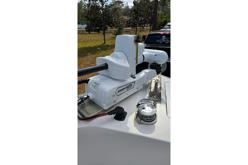 Slide: The Image of 2014 Everglades 295 Pilot boat with Minn Kota trolling motor and compass. - 19