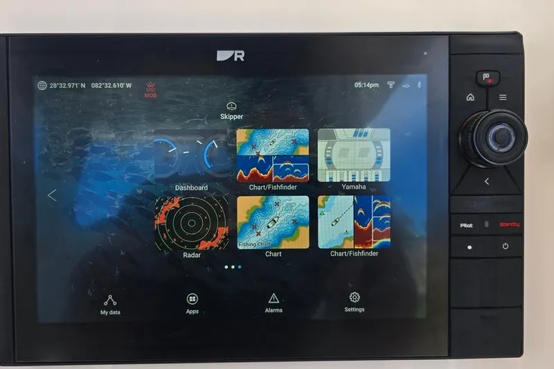 Slide: The Image of Everglades 295 Pilot 2014 navigation system displaying charts and radar interface. - 35