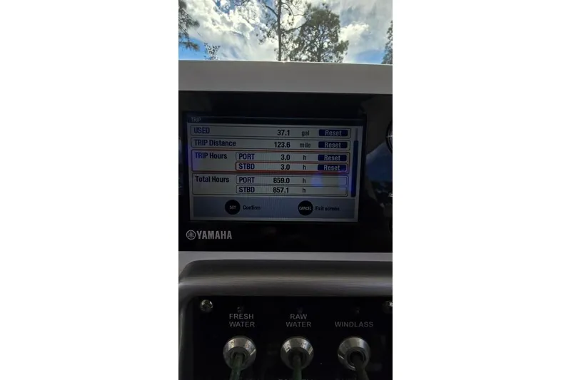 Slide: The Image of Yamaha display on 2014 Everglades 295 Pilot showing trip data and engine hours. - 59