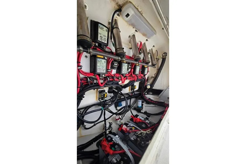 Slide: The Image of Electrical system of a 2014 Everglades 295 Pilot boat, featuring wiring and components. - 65
