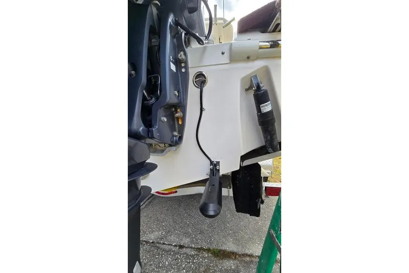 Slide: The Image of 2014 Everglades 295 Pilot boat transom with motor and equipment details. - 68