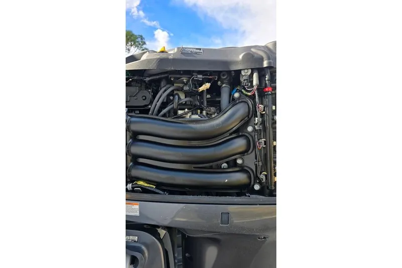 Slide: The Image of 2014 Everglades 295 Pilot engine detail with visible components and wiring. - 80