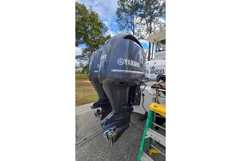 Slide: The Image of Twin Yamaha outboard engines on a 2014 Everglades 295 Pilot boat. - 9