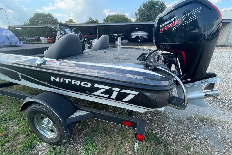 Slide: The Image of 2021 Nitro Z17 boat with Mercury Pro XS engine on a trailer. - 3