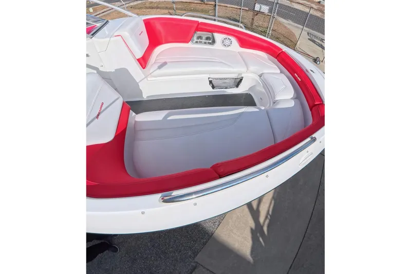 Slide: The Image of 2009 Sea-Doo 230 Wake boat, red and white, rear view, 430 HP, outdoor setting. - 12