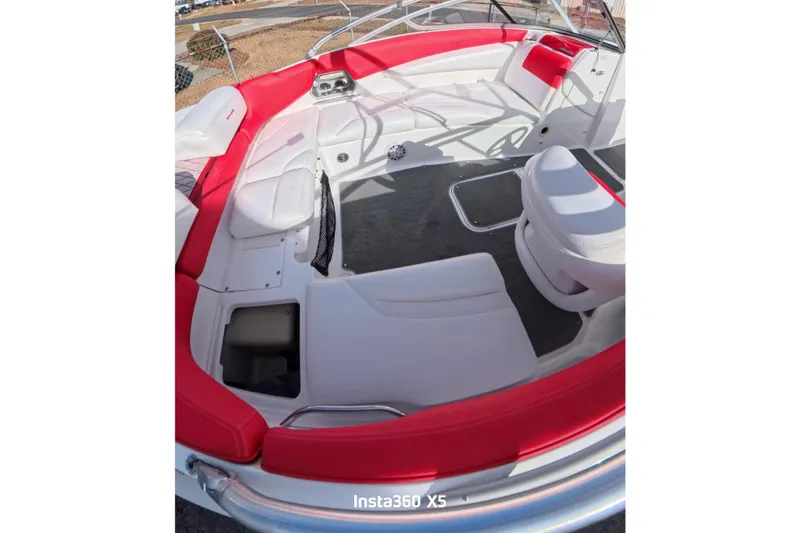 Slide: The Image of 2009 Sea-Doo Sport Boats 230 Wake on trailer under clear blue sky. - 6