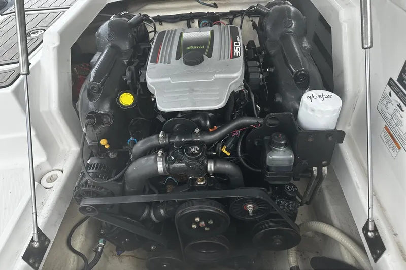 Slide: The Image of 2015 Monterey 264FS boat engine compartment with 350 horsepower motor. - 33