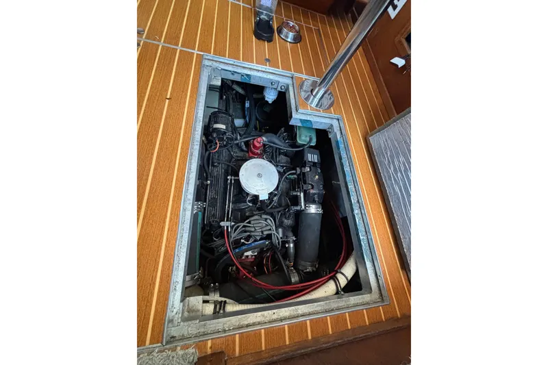 Slide: The Image of Engine compartment of 1992 Carver 28 Aft Cabin Motor Yacht with visible components. - 29