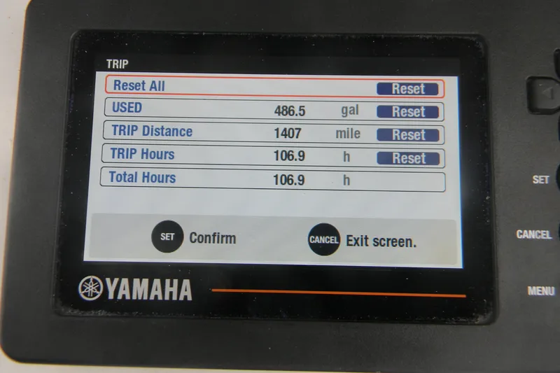 Slide: The Image of Yamaha display showing trip data: 486.5 gallons used, 1407 miles, 106.9 hours. Contender 25 Bay 2020. - 10