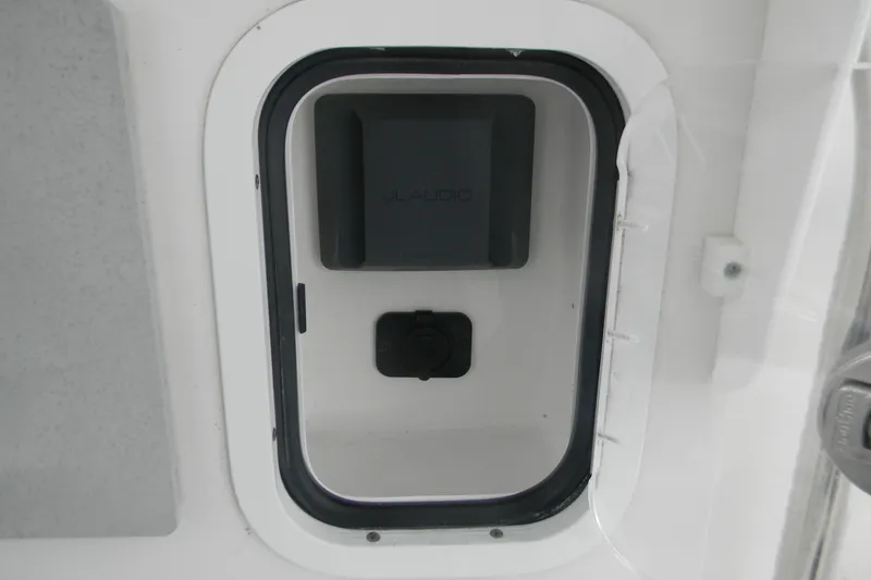 Slide: The Image of Compartment on 2020 Contender 25 Bay boat with JL Audio equipment. - 12