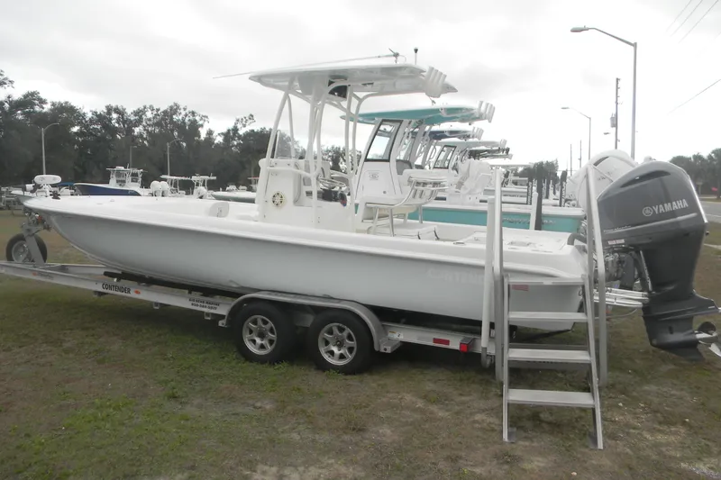 Slide: The Image of 2020 Contender 25 Bay boat on trailer with Yamaha outboard motor. - 3